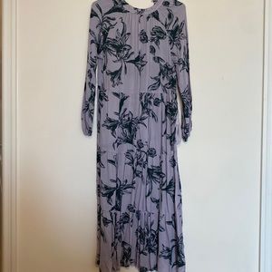 Long floral dress with slight tear